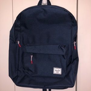 Never used navy blue Herschel backpack